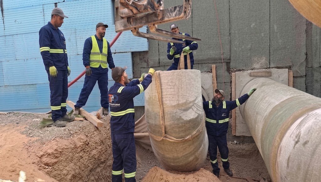 TFP jointing crew on site — large-bore GRP elbow installation